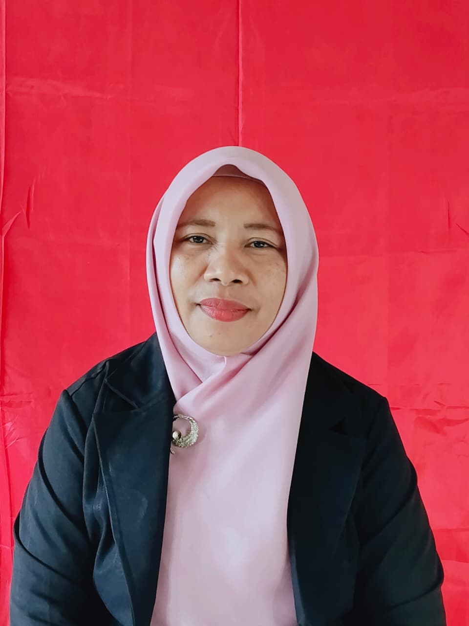 Ramlan Jelil,S.Pd